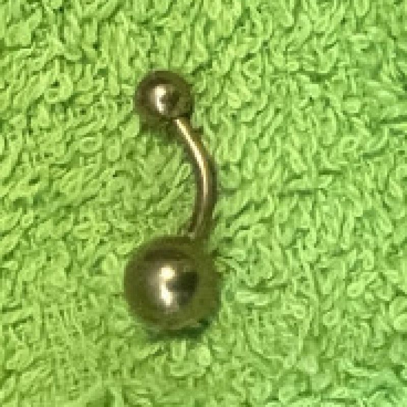 Gold pussy piercing