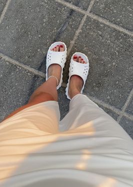 Sweaty Crocs with dirtiness from my soles