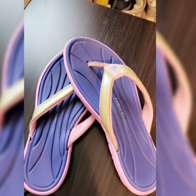 WORN FLIP FLOPS