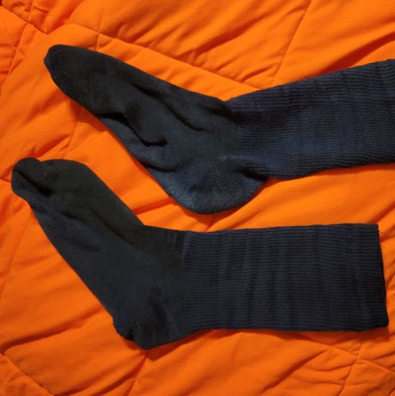 1 pair of worn black work socks