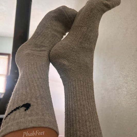 Worn long grey Nike socks
