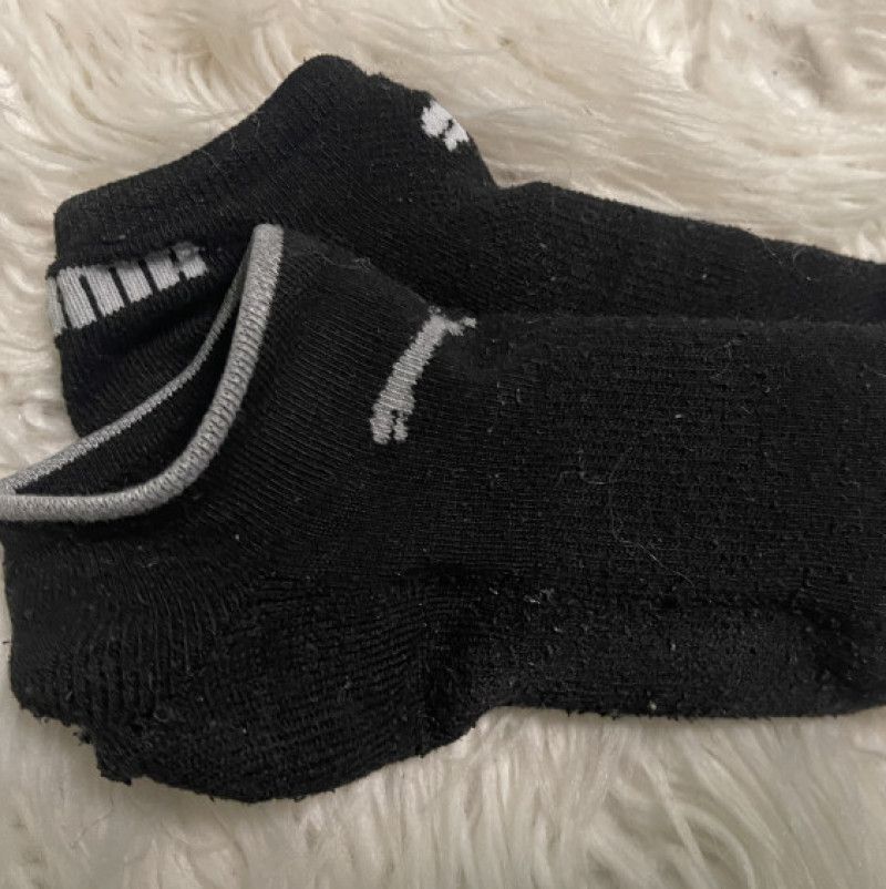 Worn Black Puma Socks