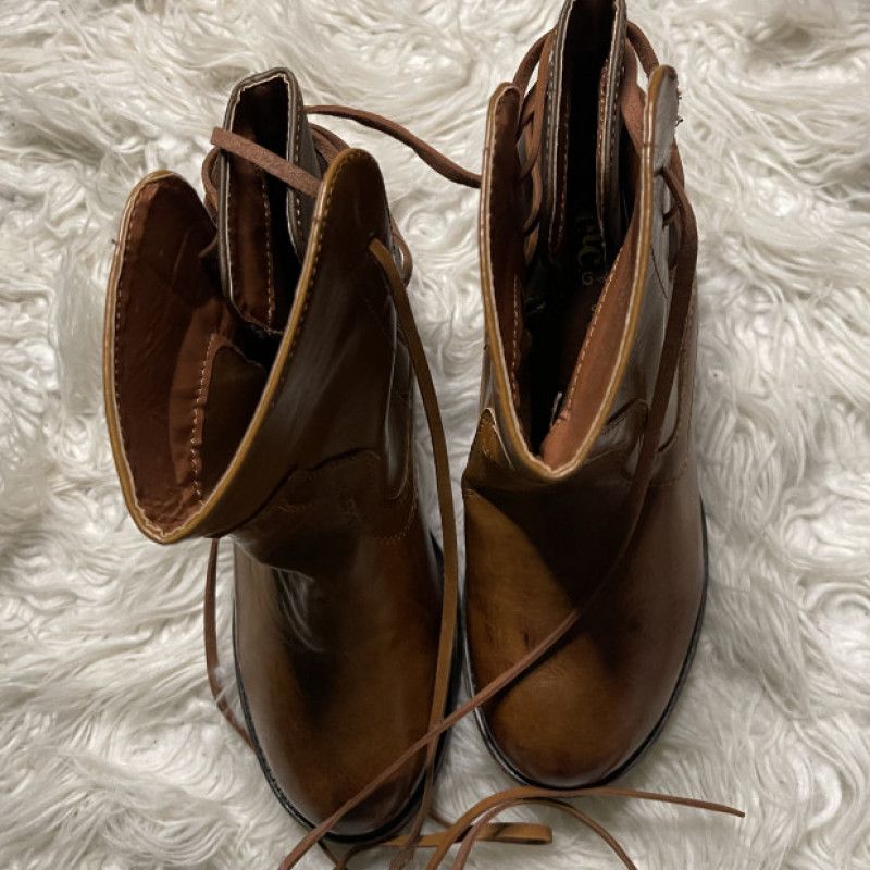 Worn Brown Boots