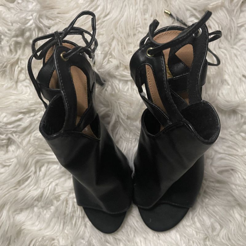 Worn Black Peep Toe Heels