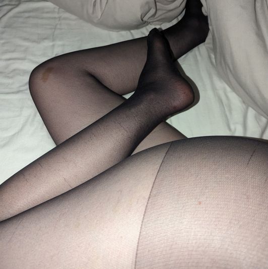 Worn black nylon tights