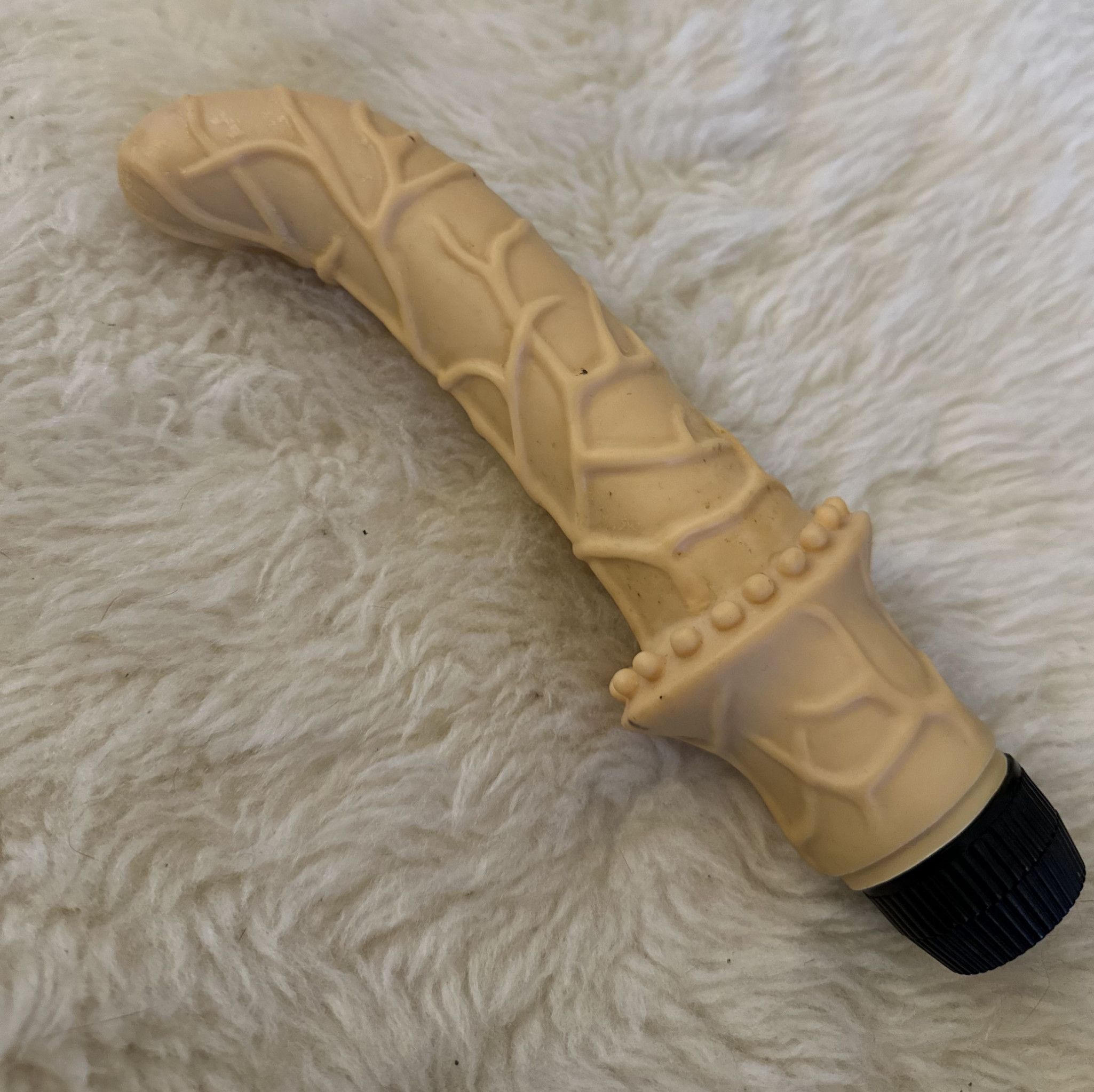 Beige ribbed dildo