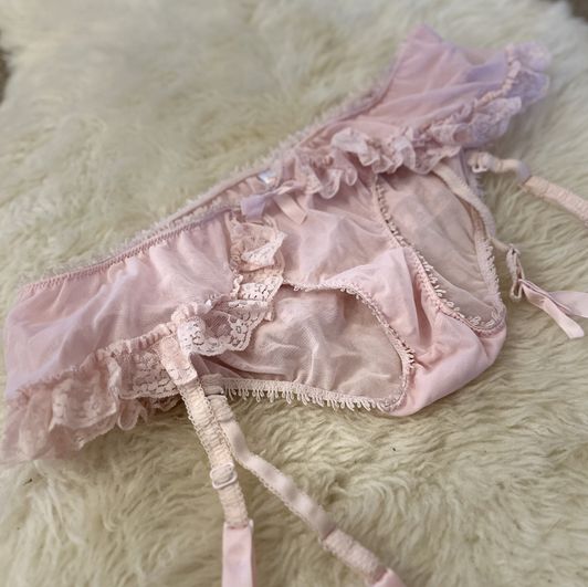 Pink panties with suspender straps