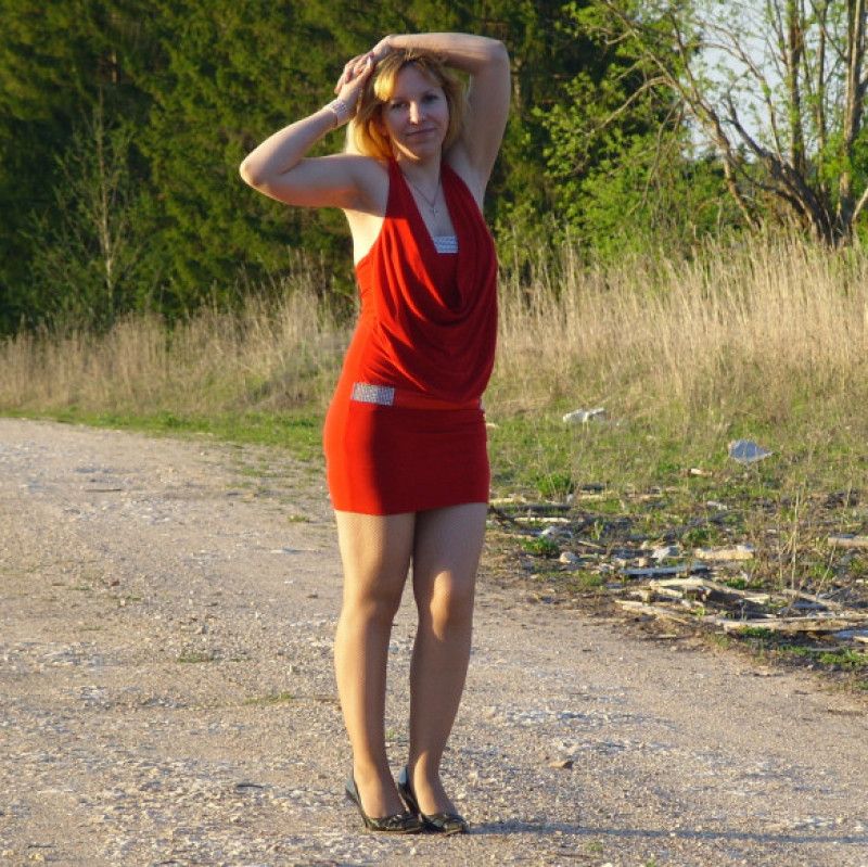 In a red dress in the woods!