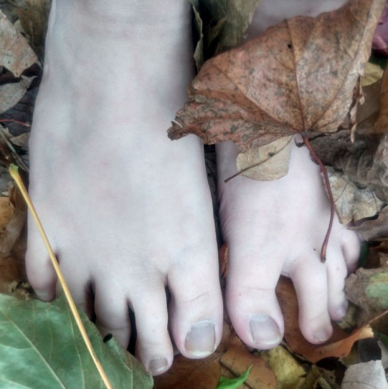 Barefoot Outdoors in the Leaf Pile