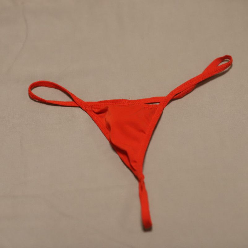 My red used micro thong