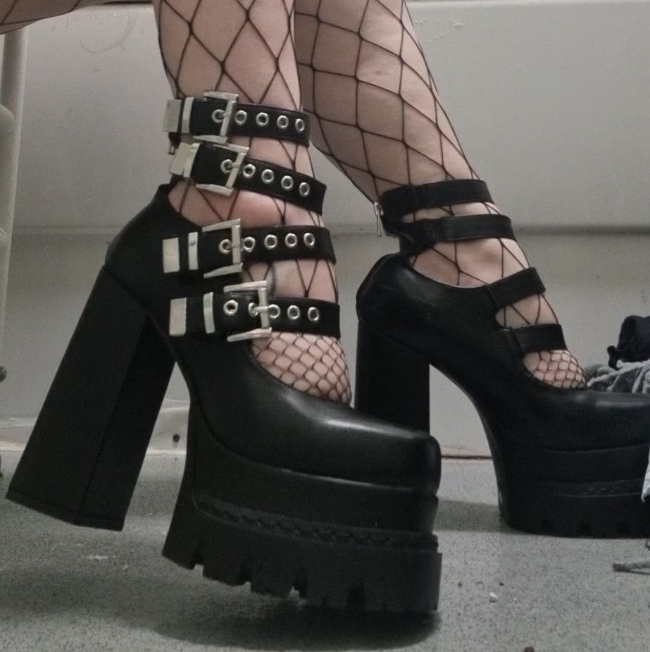 Very worn goth heels