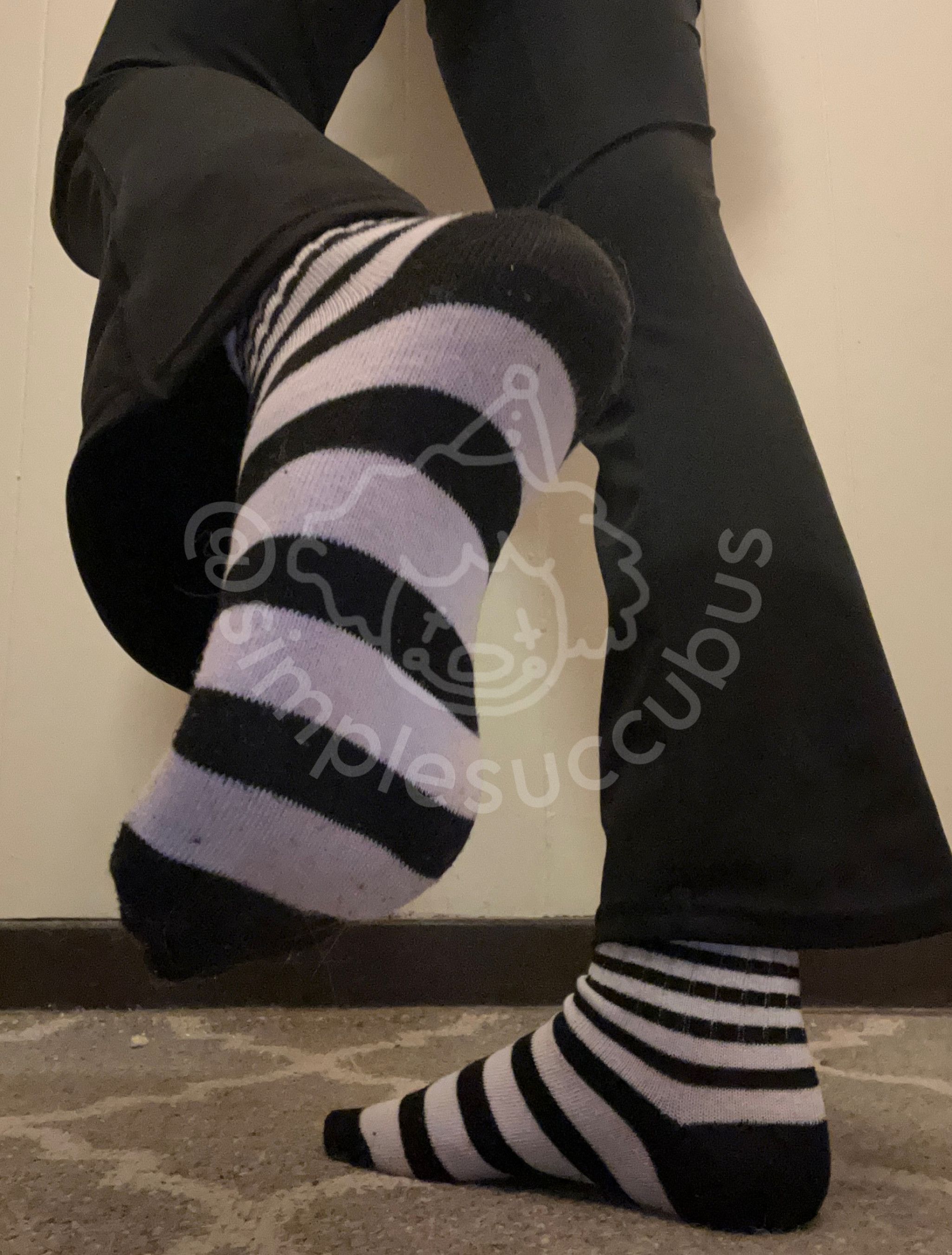 Worn Black and White Striped Crew Socks