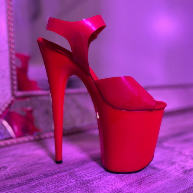 Worn Red Platform Heel