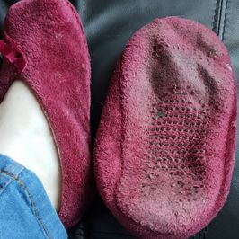 Slip on well worn slippers