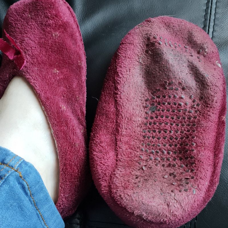 Slip on well worn slippers