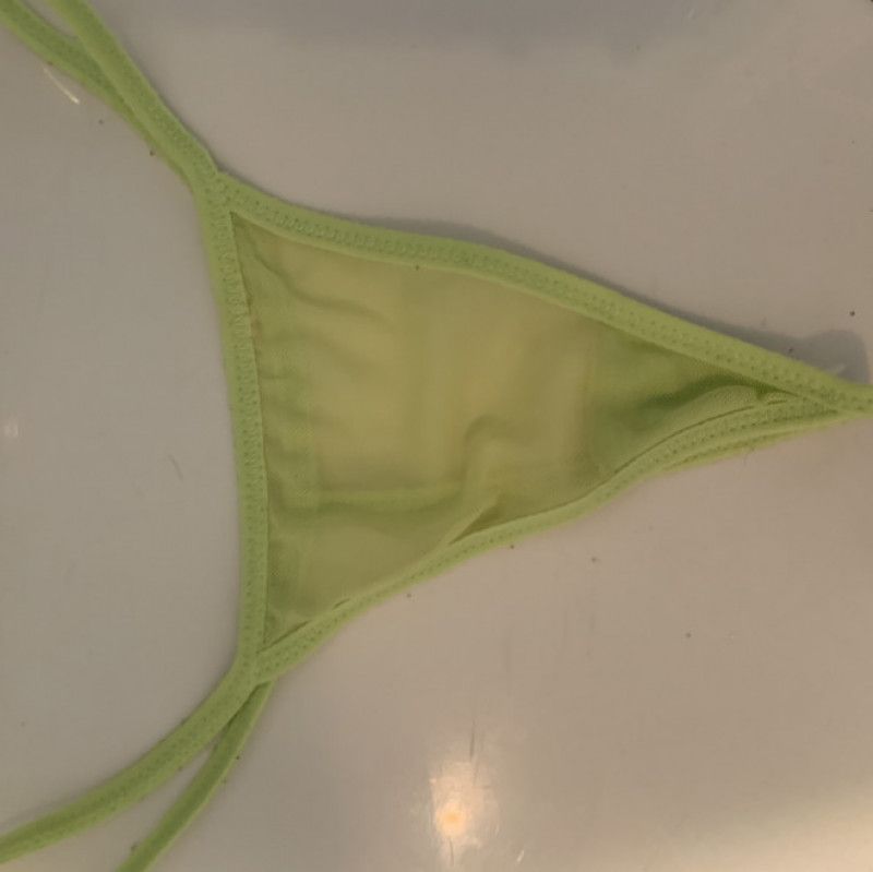 Pussy juice covered neon green thong