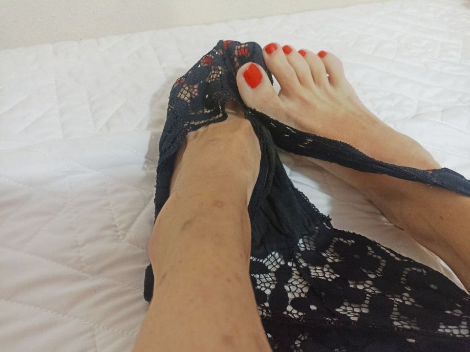 Feet playing with panties