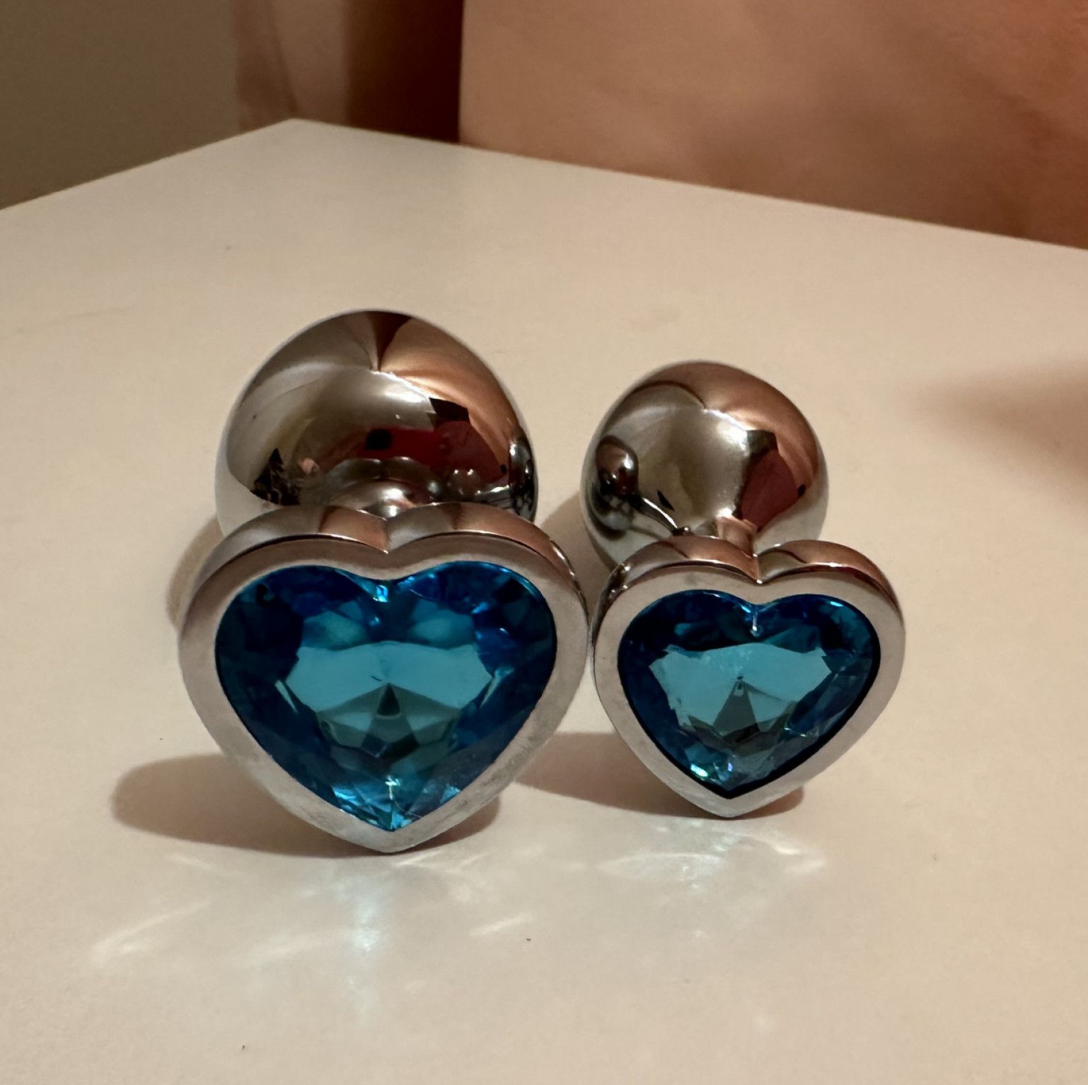 Blue loveheart steel buttplugs large and medium