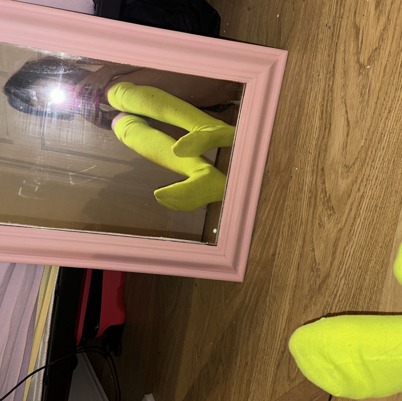 worn neon yellow knee high socks