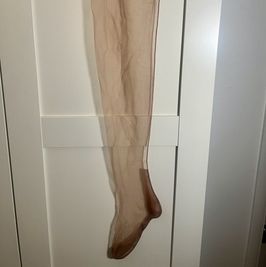 Beige full fashioned nylon stocking