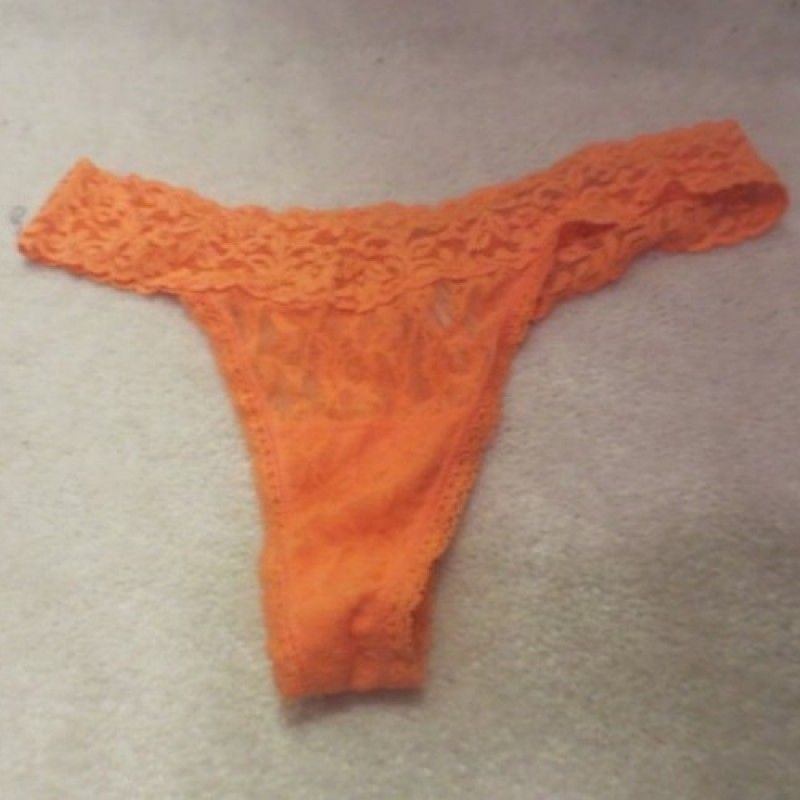 ORANGE THONG VICTORIA SECRET CUM STAINED