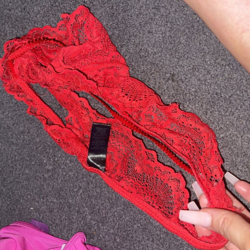 Worn red lingerie and dirty red panties