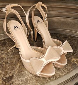 Worn bow heels