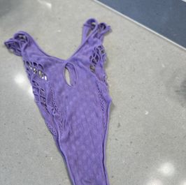 Lilac bodysuit worn many times