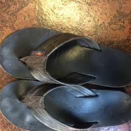 Worn Rainbow Flip Flops