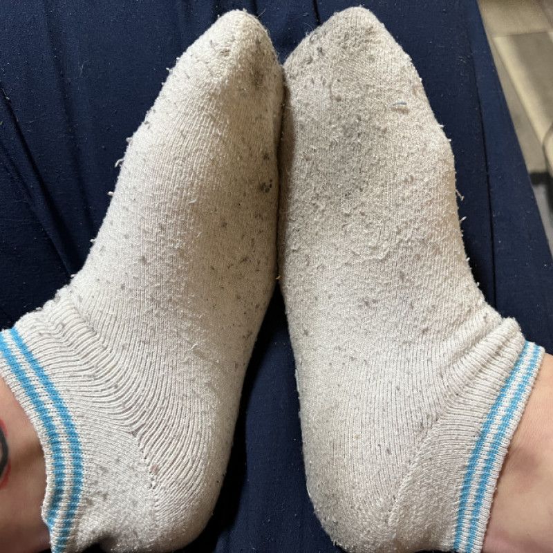 Very worn white ankle socks