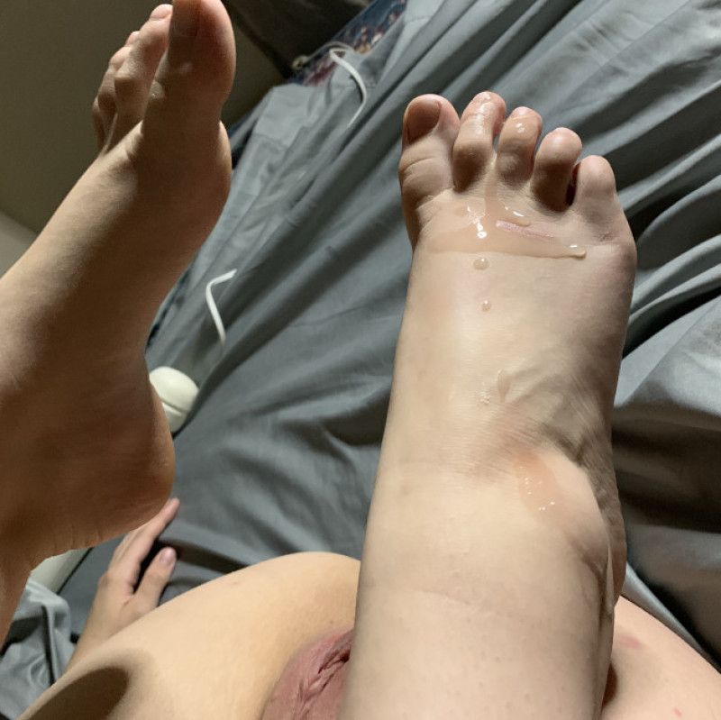 Feet covered in cum