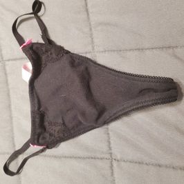 Black thong with 2 pink ribbons