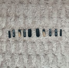 Worn Black Fake Nails