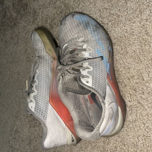 Dirty damaged old gym sneakers