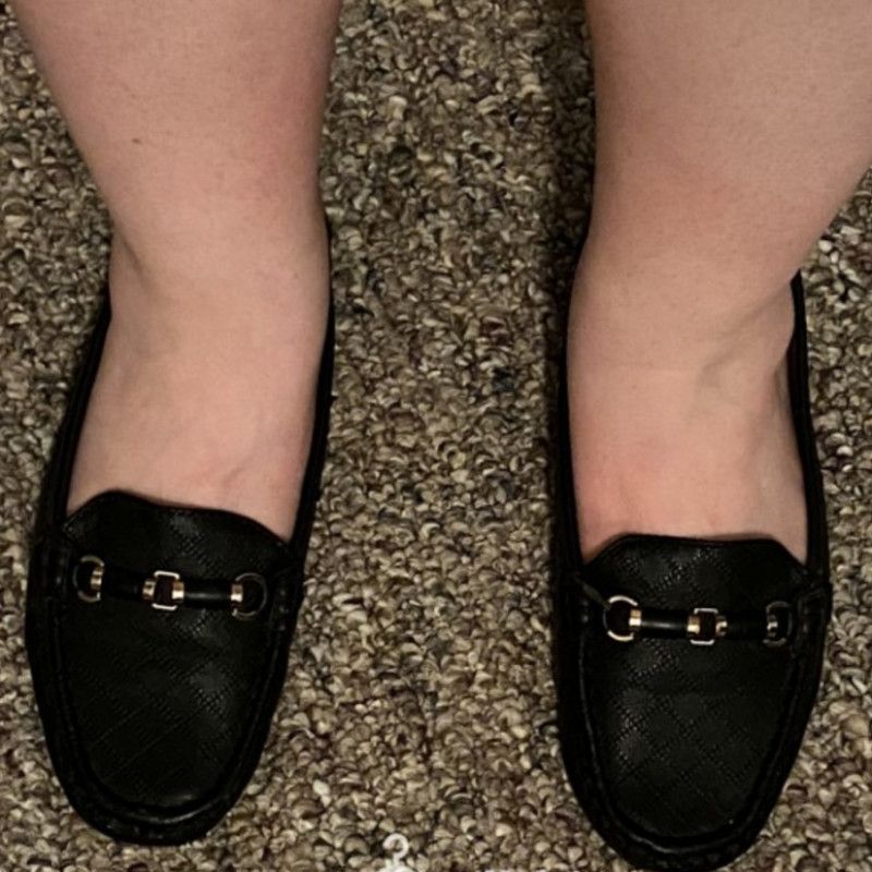 Worn Black Leather Flats With Ornament