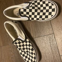 Worn Black and White Vans