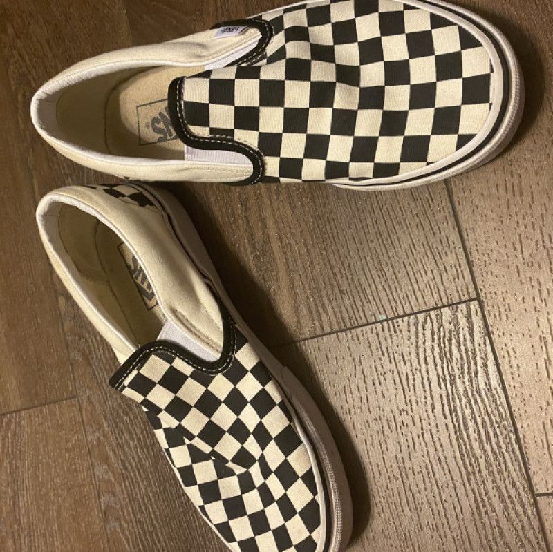 Worn Black and White Vans