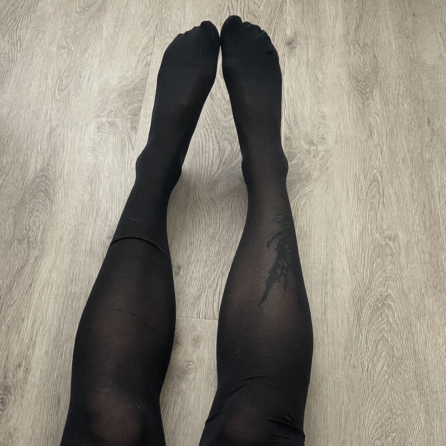 WORN BLACK STOCKINGS WITH BOWS