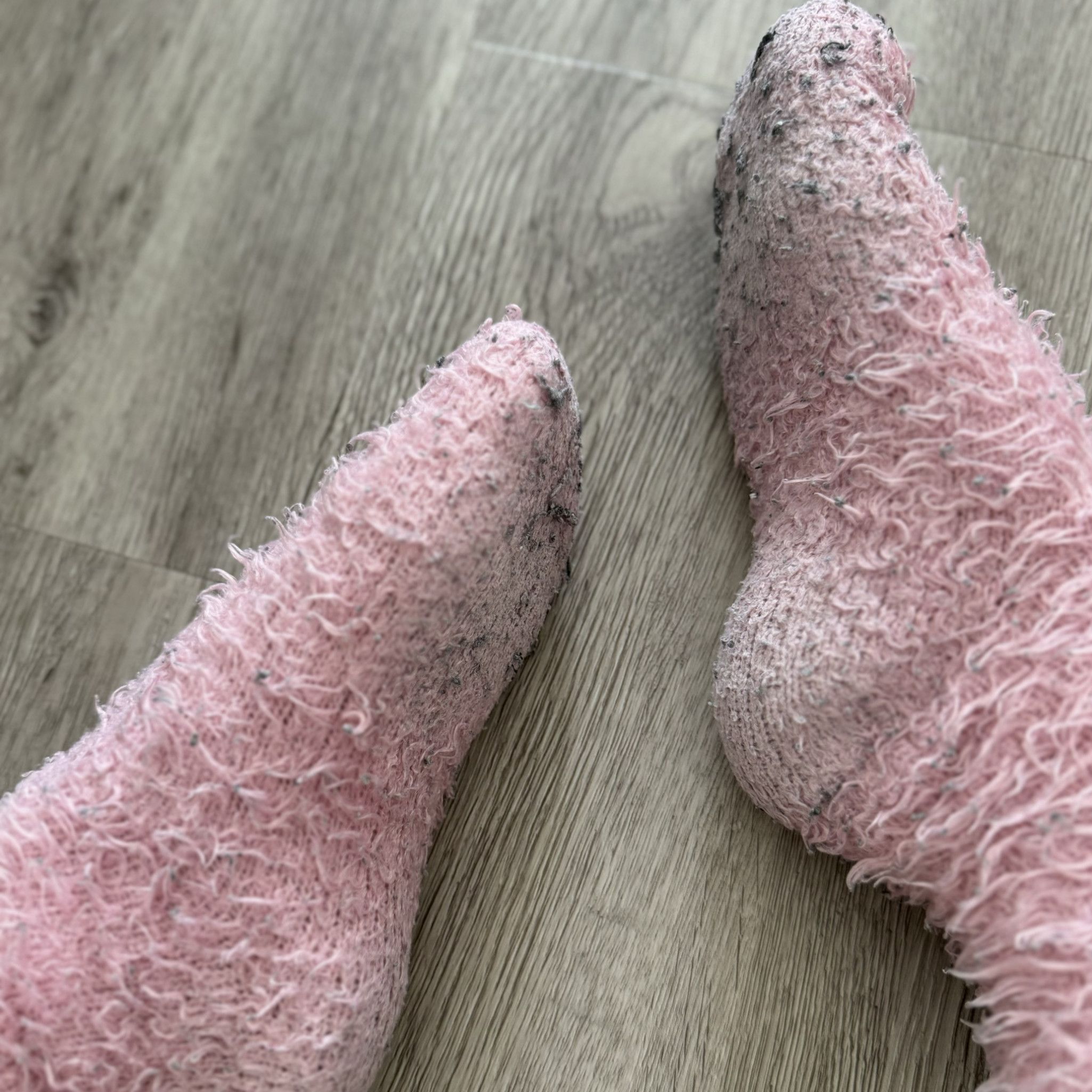 WORN PINK FLUFFY SOCKS