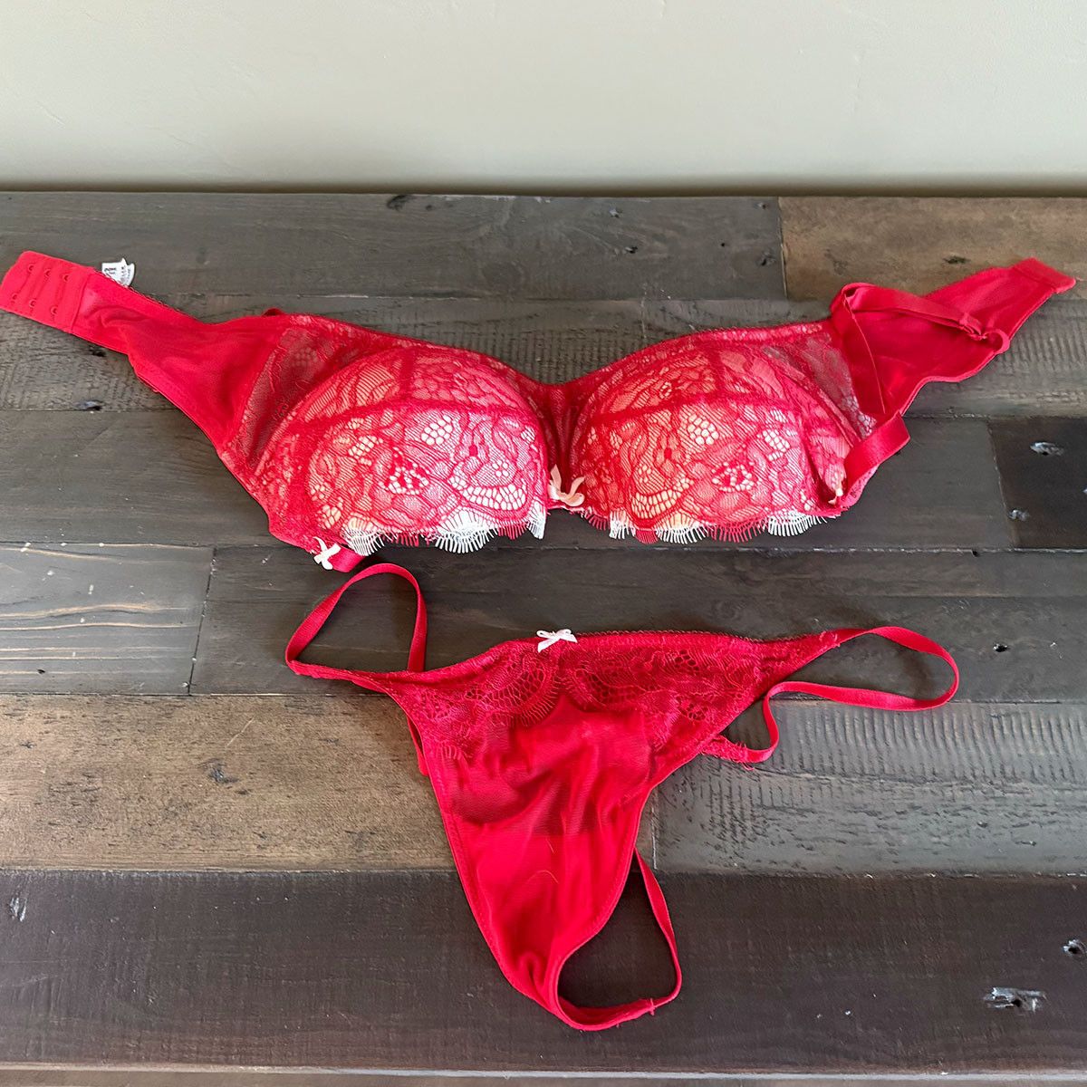 Worn Red Lace Bra and Panty Set