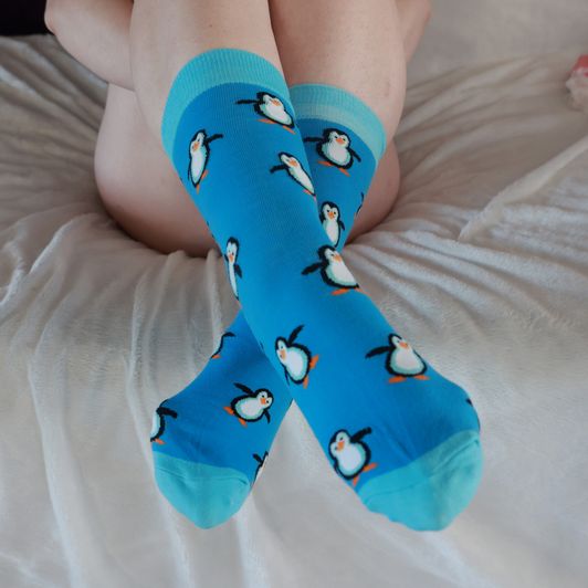 Worn Blue Penguin Socks