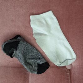 Two dirty worn in socks