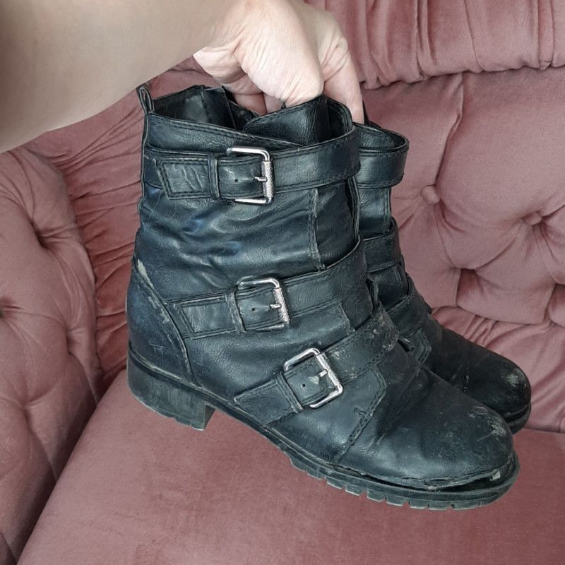 Extremely worn and dirty boots