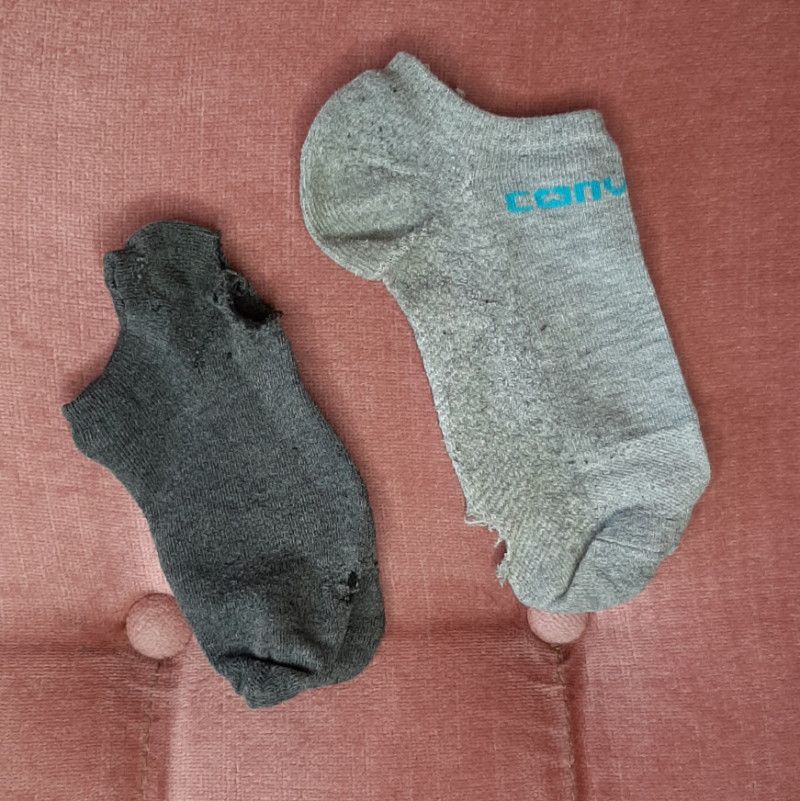 Extremely worn and dirty socks