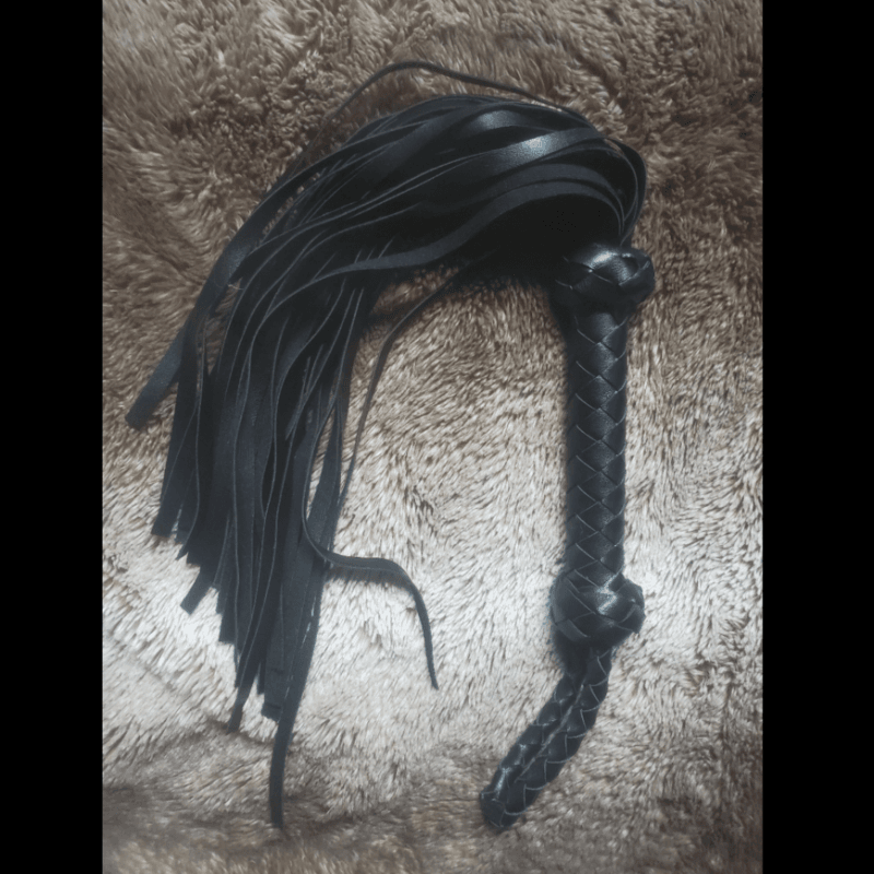 black faux leather flogger