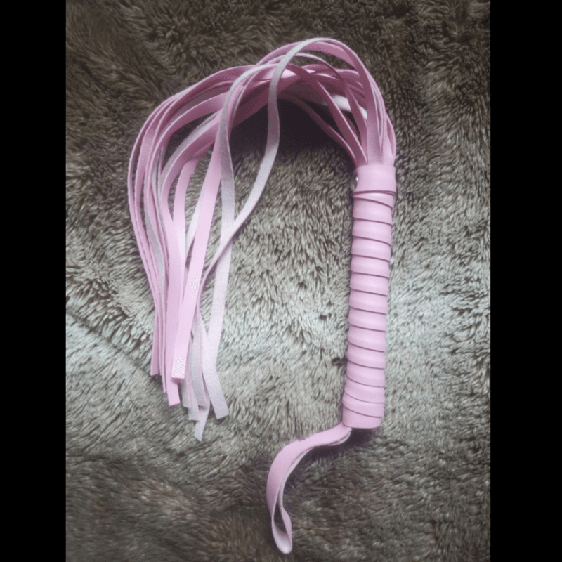 pink faux leather flogger