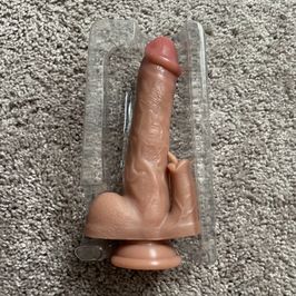 Vibrating dildo with tongue