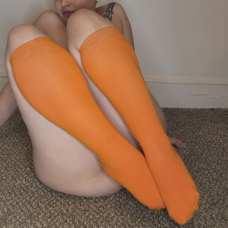 Worn Orange Knee High Socks