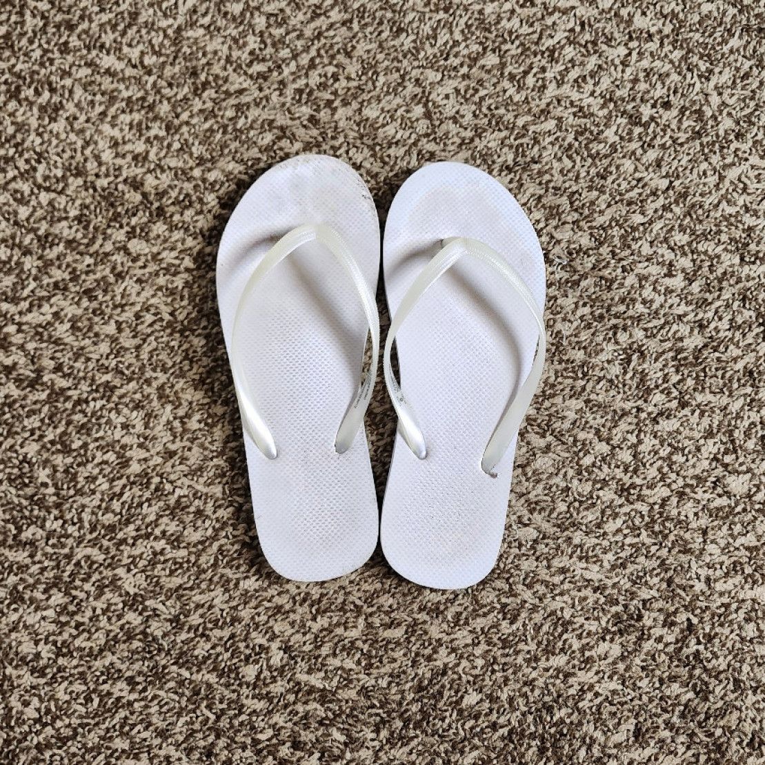 Dirty White Flip Flops