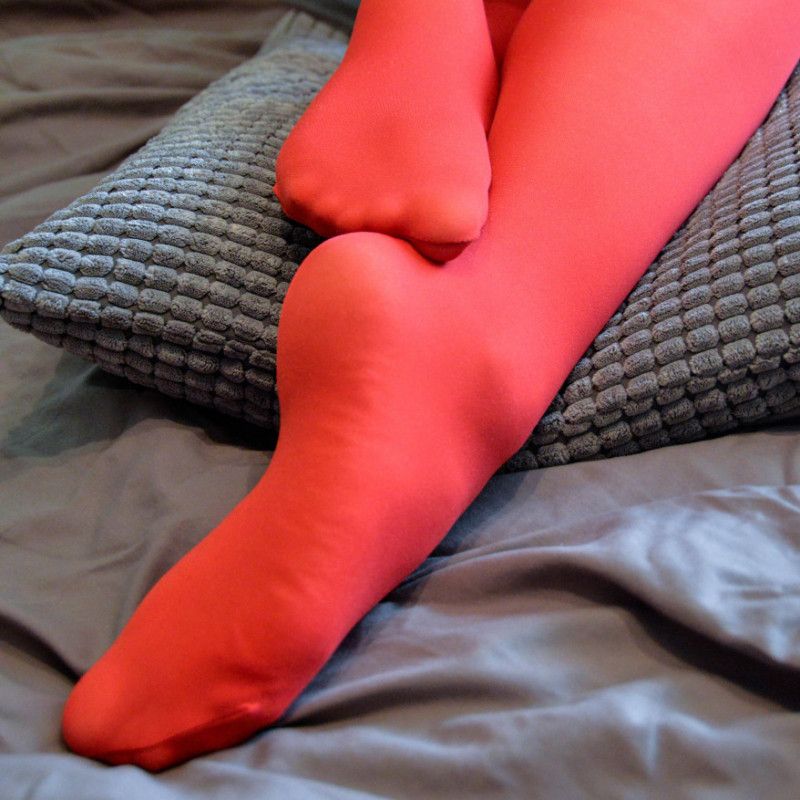 Sexy legs in red pantyhoses